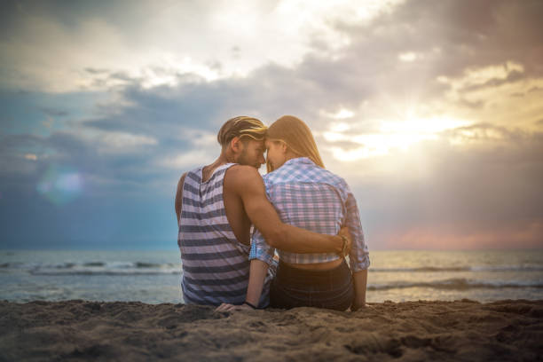 istock Beautiful couple solitude at the beach 998829542