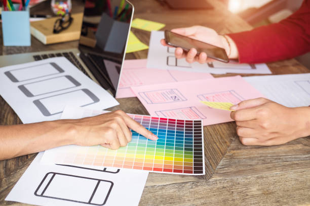 istock Web designer meeting  planning application for mobile phone. Design Online Technology Content, Ideas Proposal Strategy Tactics Vision Design Concept 998832506