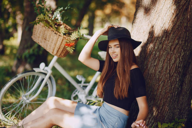 istock Girl with a bike 998832946
