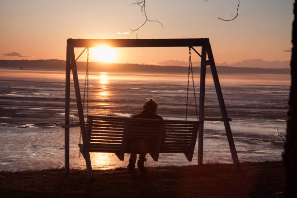 istock Young Unrecognizable Woman Enjoying Mid Summer Sun 998833044