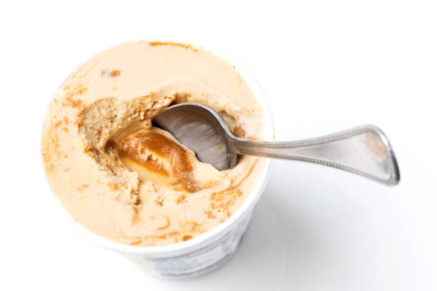 Dulde de Leche Ice cream Dulde de Leche Ice cream from above on white background dulce de leche stock pictures, royalty-free photos & images