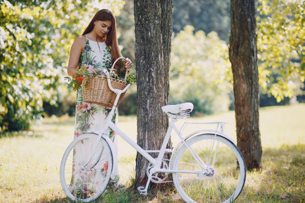 istock Girl with a bike 998833180