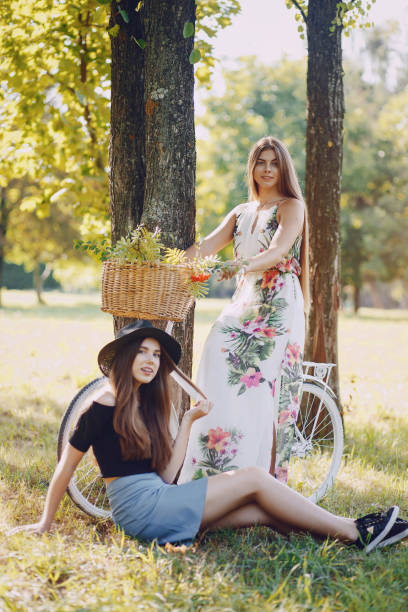 istock Girls in a park 998833228