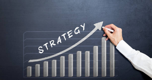 istock strategy word concept with chalk on the blackboard and graph 998833274