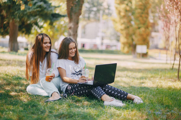istock girls with a laptop 998833366