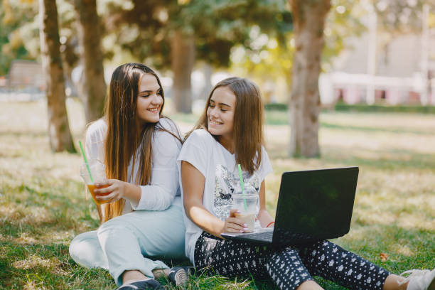 istock girls with a laptop 998833376