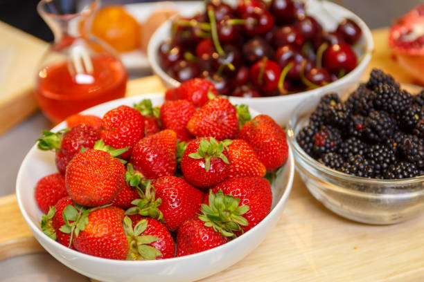 istock Fresh Strawberries Blackberries and Cherries 998839336