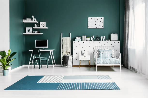 istock Spacious green kid's room interior 998846862