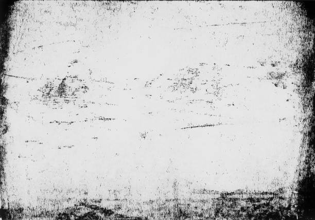 istock A lino printed, distressed, grunge texture background in black and white. 998869166