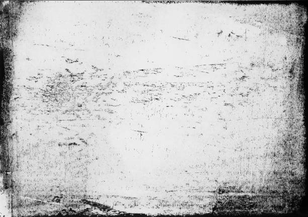 istock A lino printed, distressed, grunge texture background in black and white. 998869256