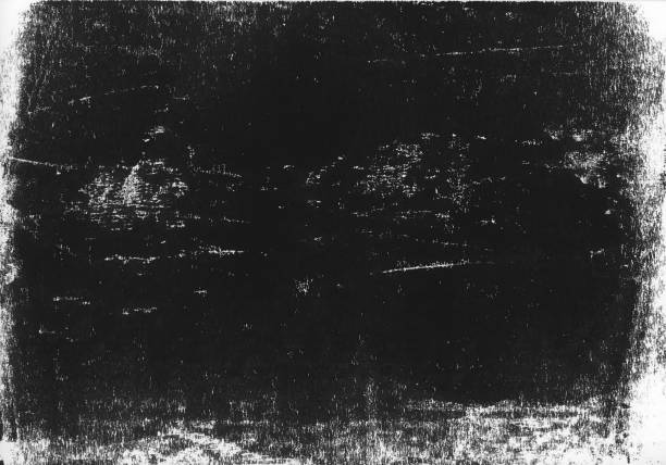 istock A lino printed, distressed, grunge texture background in black and white. 998869362