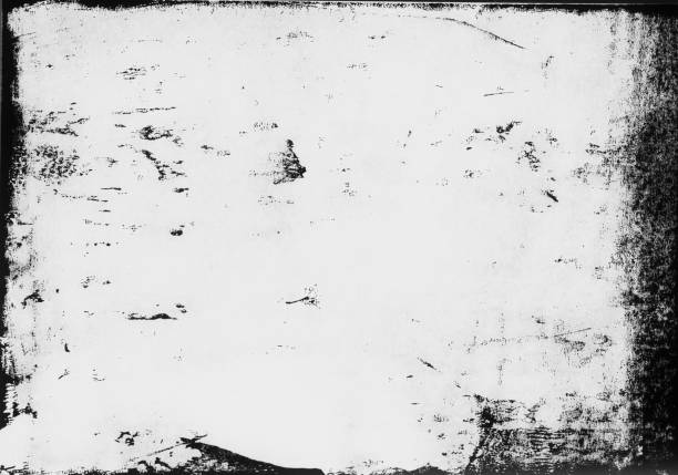 istock A lino printed, distressed, grunge texture background in black and white. 998869416