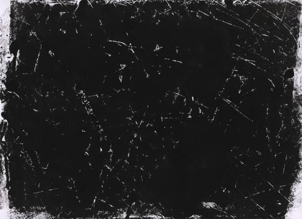 istock A lino printed, distressed, grunge texture background in black and white. 998869542