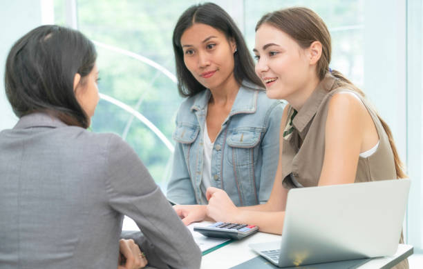 istock Multicultural businesswomen in group meeting. 998885444