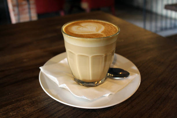 istock A cup of hot cafe latte (plus its latte art) served hot 998885616