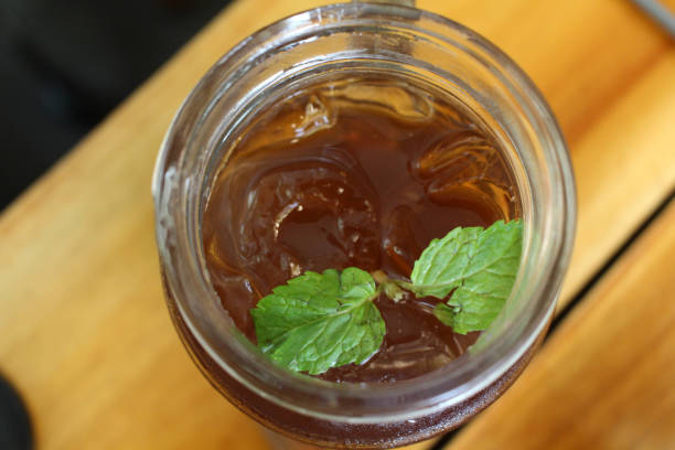 A cup of ice lemon tea, served at a cafe. Fresh!