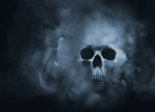 high contrast image of a skull in a smoke cloud Scary skull emerging from a cloud of smoke / high contrast image smoke physical structure stock pictures, royalty-free photos & images