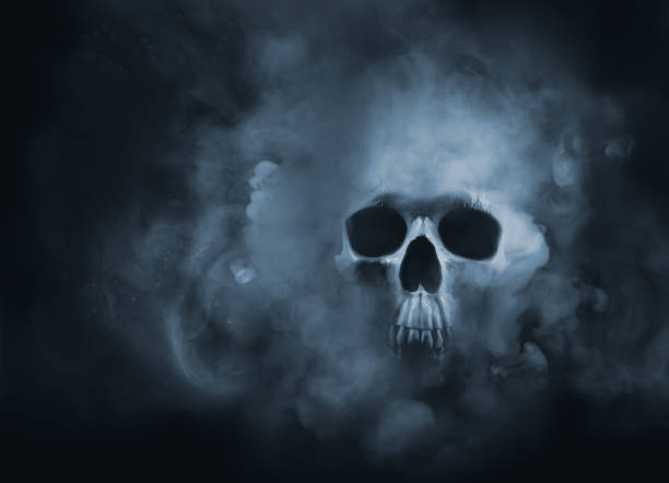 high contrast image of a skull in a smoke cloud - caveira imagens e fotografias de stock