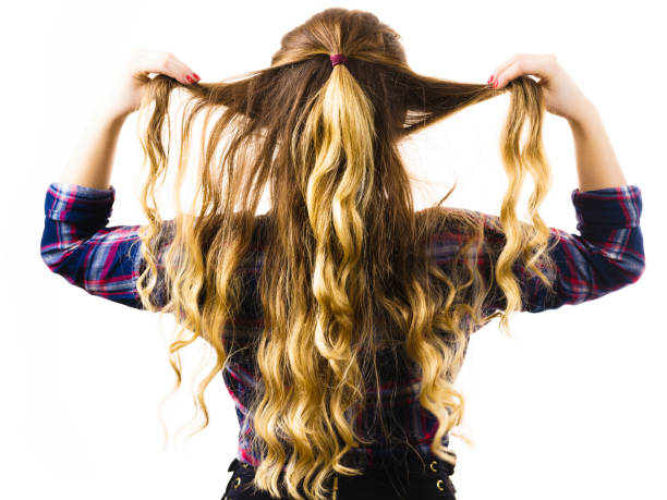 istock Back view on woman curly hair 998926272