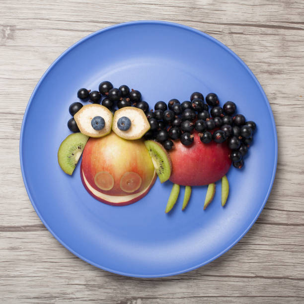 istock Sheep made with fruits on plate and board 998936464