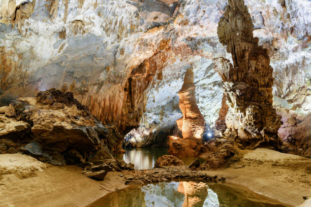 istock Amazing stalagmite reflected in water inside Phong Nha Cave 998940180