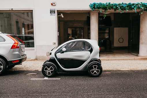Small black and grey Smart car parked on the street. Novi Sad, Serbia. June - 24. 2018.