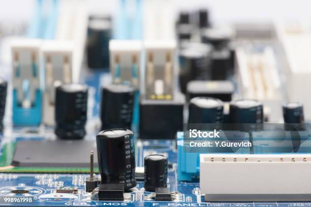 Electronic Board The Board Features Elements Chips Diodes Capacitors Chokes Shallow Depth Of Field Can Be Used As A Background There Is A Place For An Inscription Stock Photo - Download Image Now