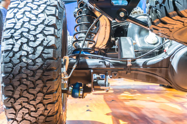 istock undercarriage car new and New car wheel 998964362