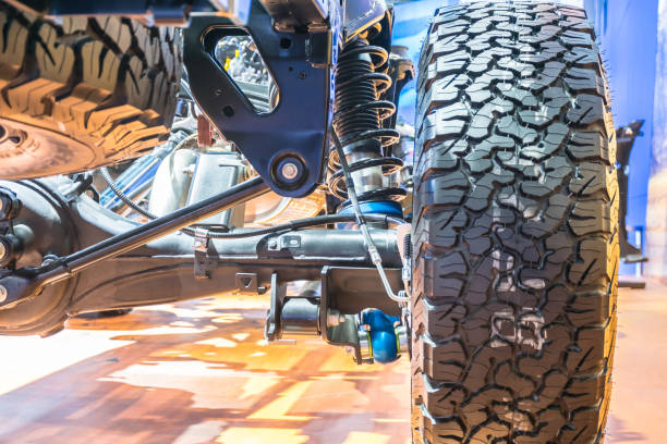 istock undercarriage car new and New car wheel 998964388