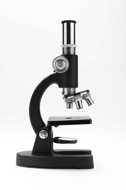 old scientific microscope old scientific microscope microscope isolated stock pictures, royalty-free photos & images