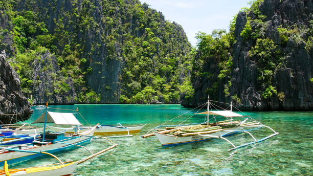 istock Boats on colorful water in Philippines 998976642