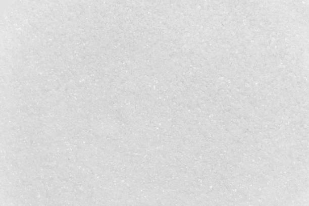 istock Pure refined sugar. Texture of sugar 998977840