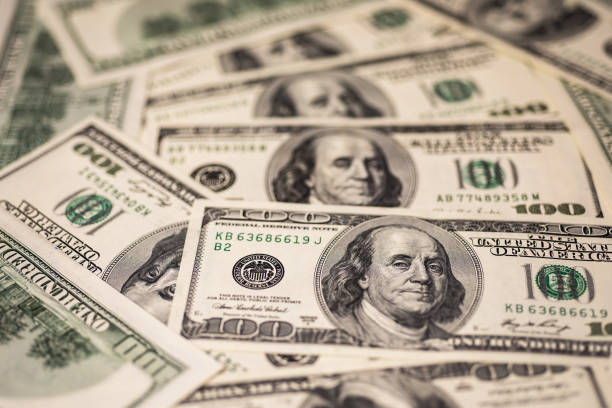 istock Background of one hundred dollar bills 998979700