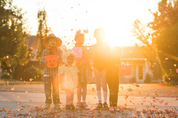 istock Multiethnic group of kids trick or treating 998983092
