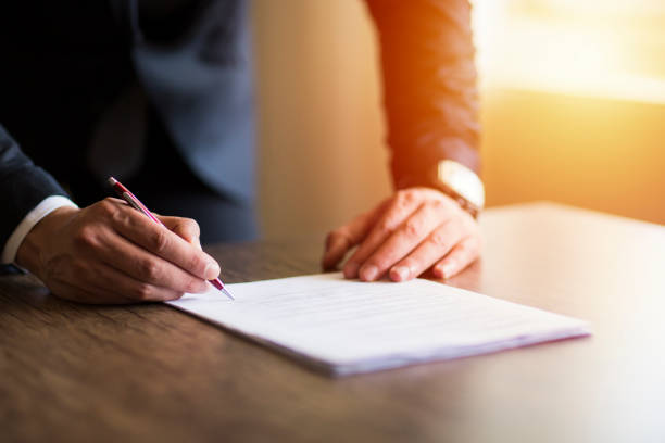 istock Business man signing contract, making a deal 998983938