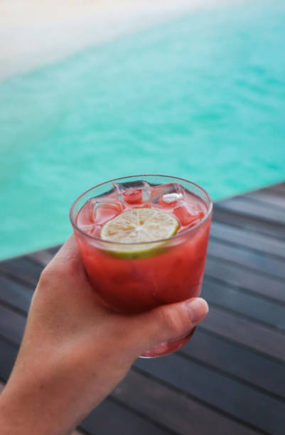 istock red cocktail by the sea 998984754