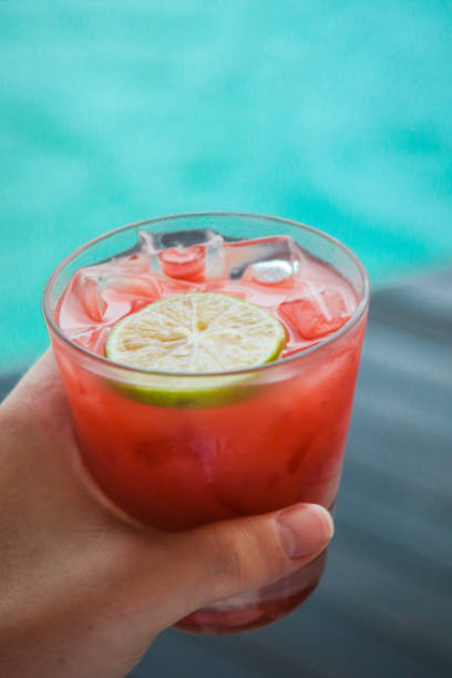 istock red cocktail by the sea 998984756