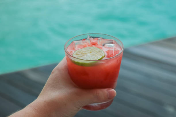 istock red cocktail by the sea 998984780
