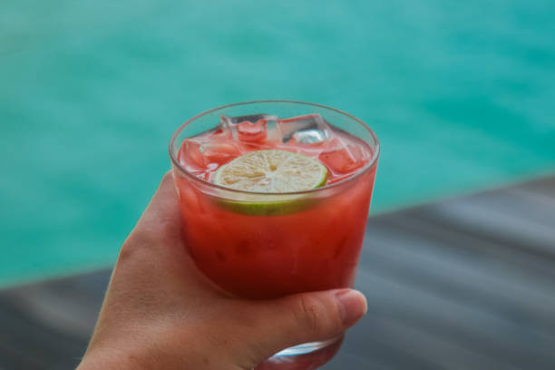 istock red cocktail by the sea 998984832