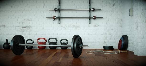 istock Workout Room with different Weight Lifting Equipment dumbbell, barbell, kettlebell 998994174