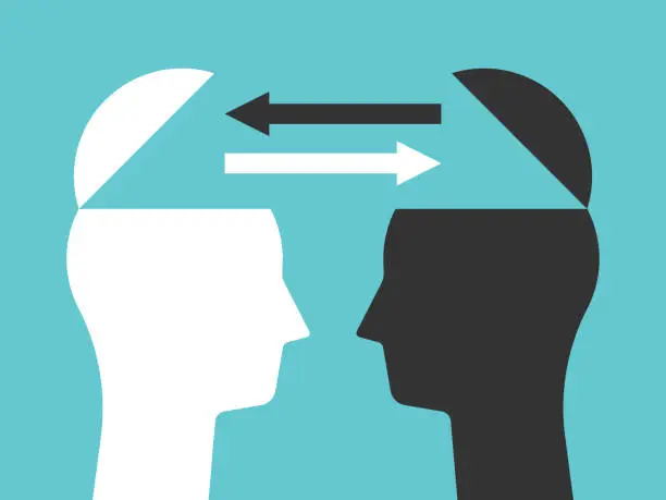 Vector illustration of Two heads exchanging thoughts