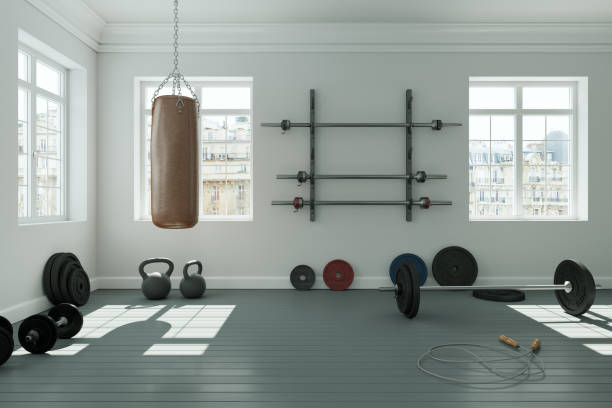 istock Workout Room with different Weight Lifting Equipment dumbbell, barbell, kettlebell 998997036