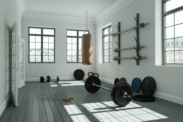 istock Workout Room with different Weight Lifting Equipment dumbbell, barbell, kettlebell 998997062