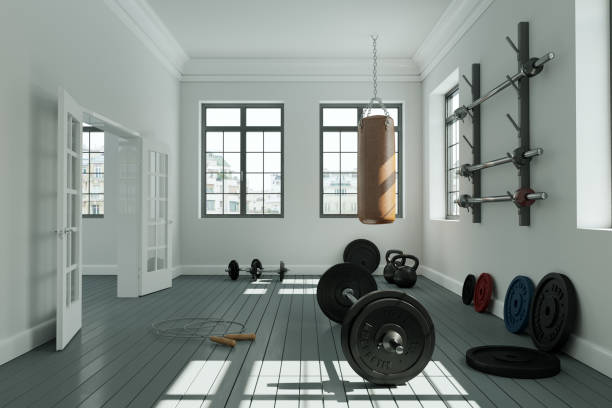 istock Workout Room with different Weight Lifting Equipment dumbbell, barbell, kettlebell 998997084