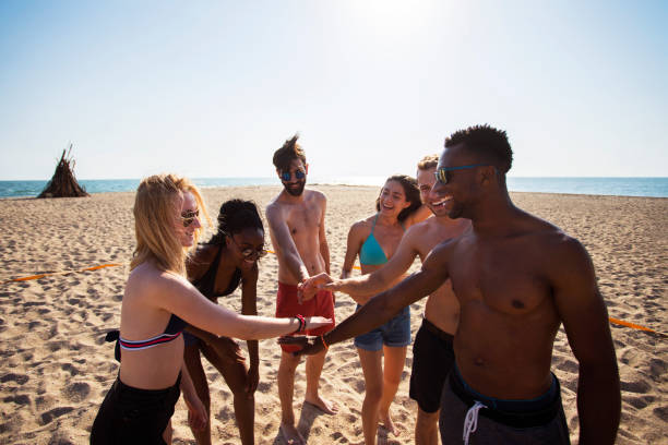 istock Volleyball with friends at the beach 998997166