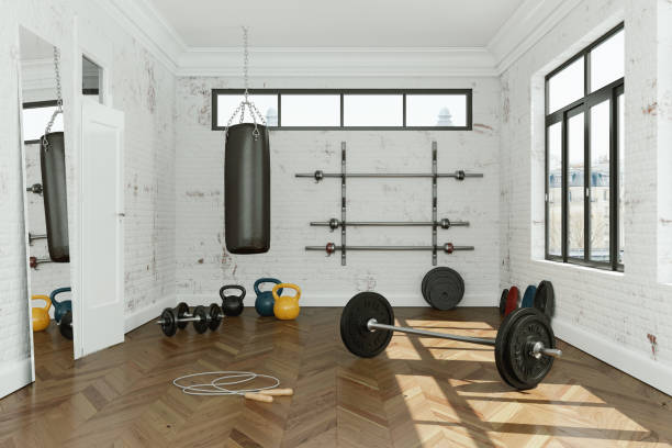 istock Workout Room with different Weight Lifting Equipment dumbbell, barbell, kettlebell 998997230