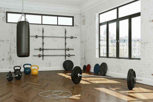 istock Workout Room with different Weight Lifting Equipment dumbbell, barbell, kettlebell 998997272