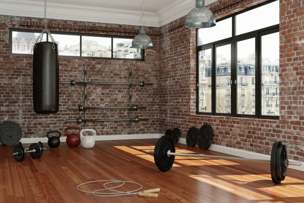 istock Workout Room with different Weight Lifting Equipment dumbbell, barbell, kettlebell 998997540