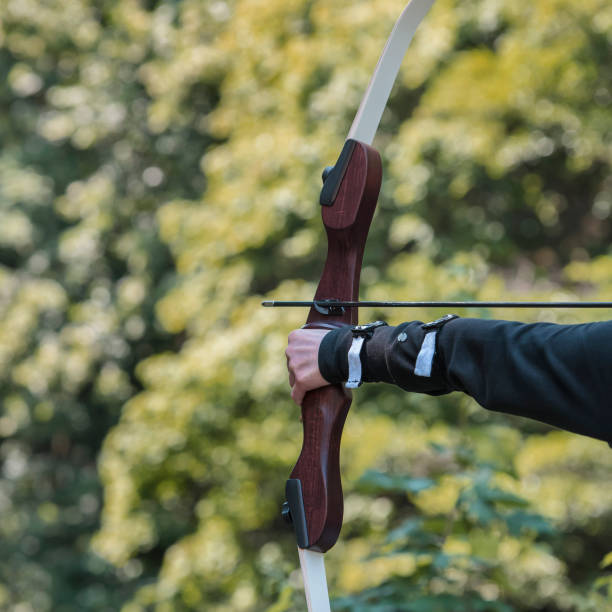 istock Training exercises for shooting archery on an outdoor target. 999008044
