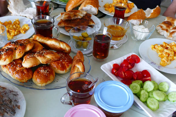 istock Turkish breakfast table, making a Turkish family breakfast, 999012128